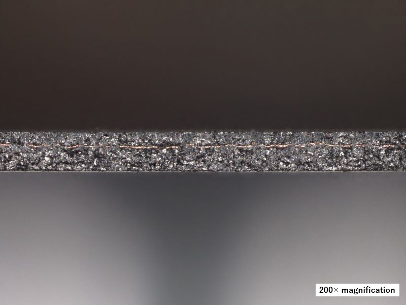 Cross section of the Punched Anode (magnified 200×)